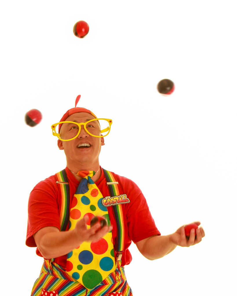 Goofball juggling at kids magic show